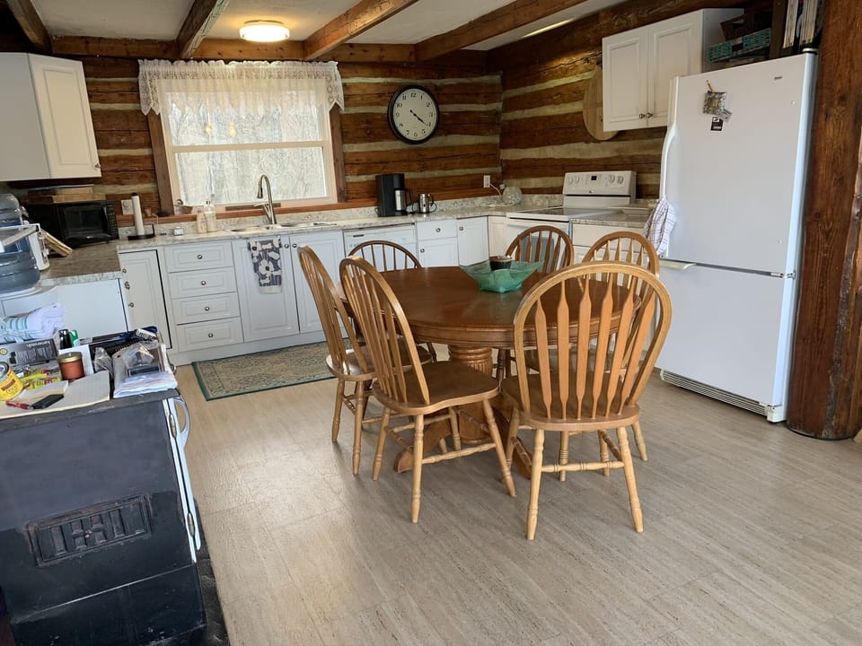 Kitchen with dishwasher, stove, microwave and 2 fridges. Many kitchen amenities