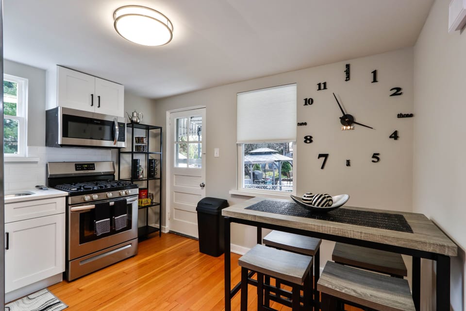 kitchen with hightop table that seats 4