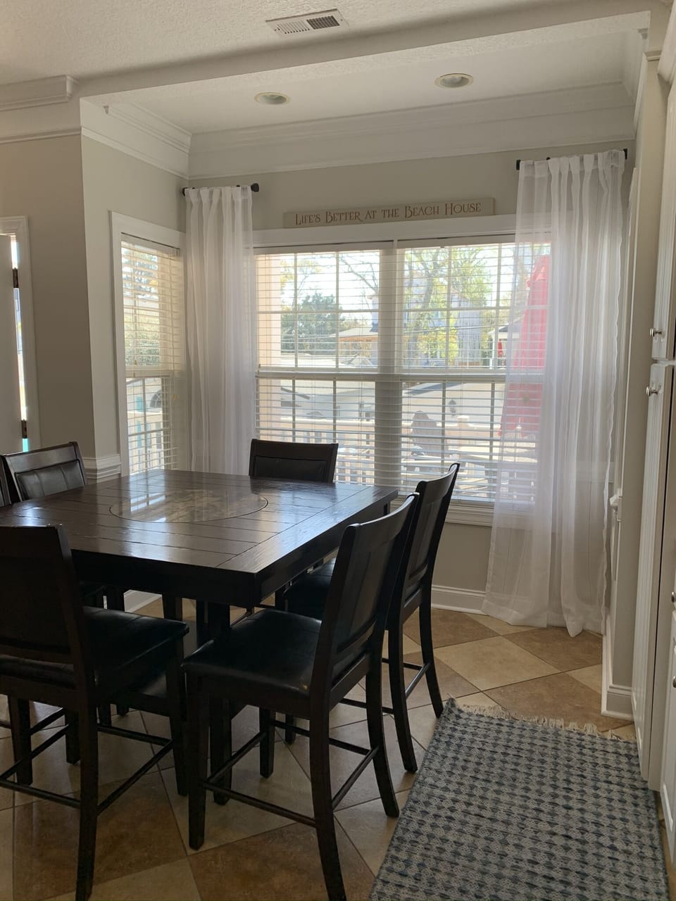 kitchen table in the kitchen/living room open concept