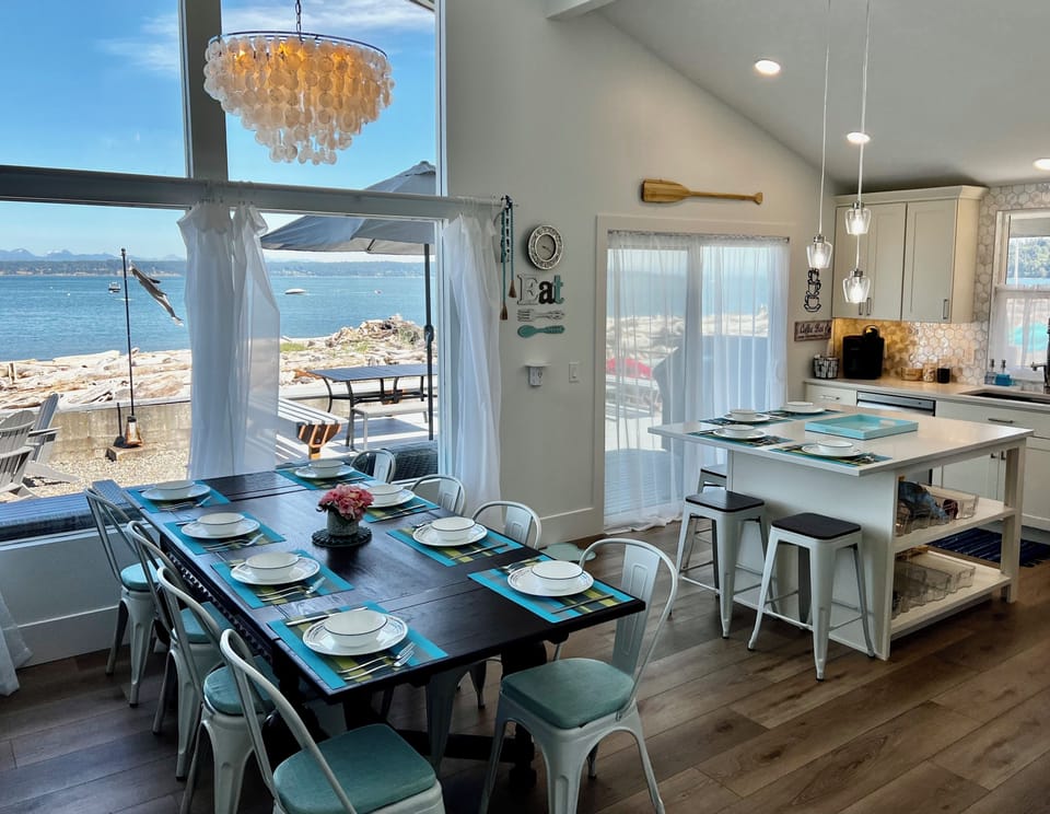 Dining for 8 w/ additional 4 seats at kitchen island.
