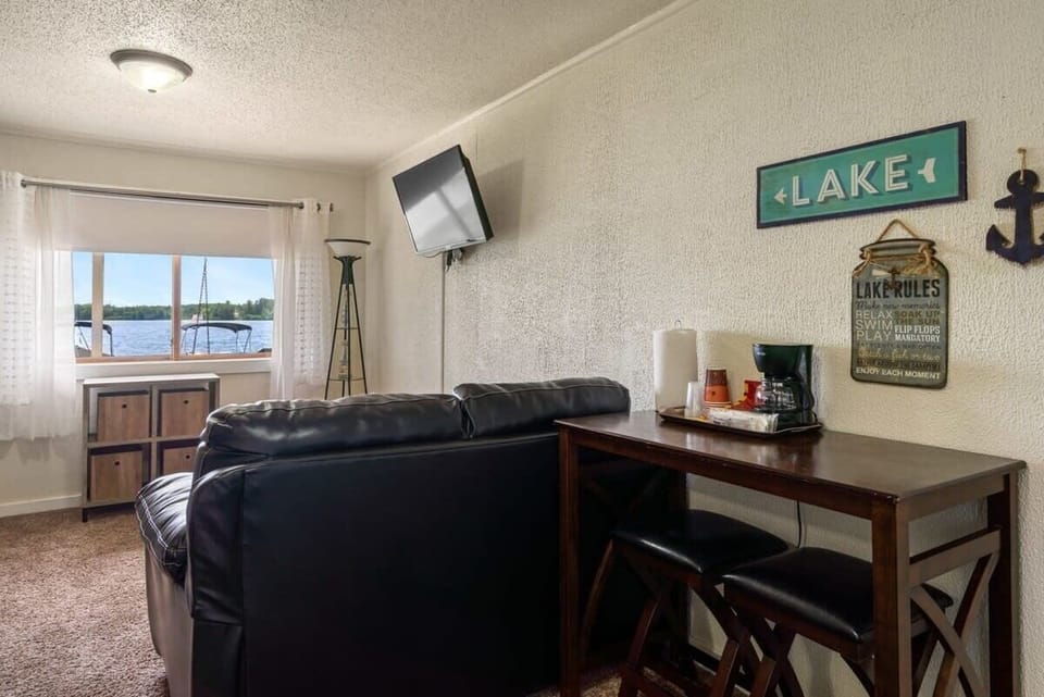 Unit 5: Bar table seating for 2 & coffee provided