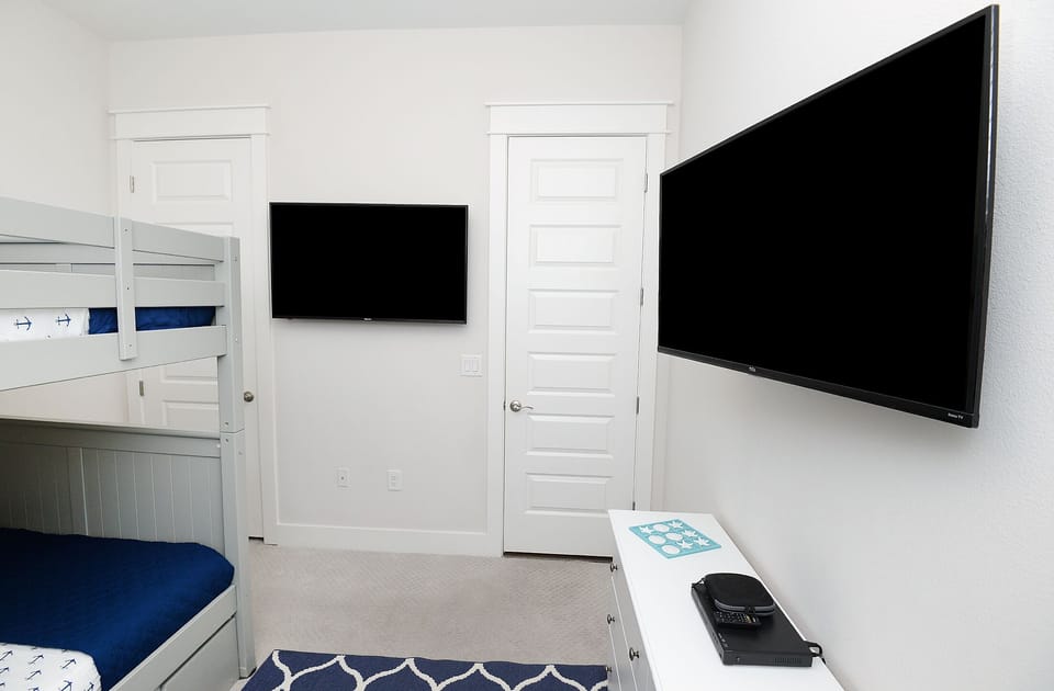 3rd bedroom with 2 smart tvs for gaming and streaming options