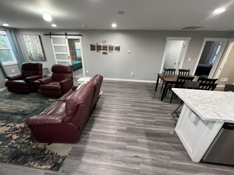 Main room, and view of the three bedroom on far side