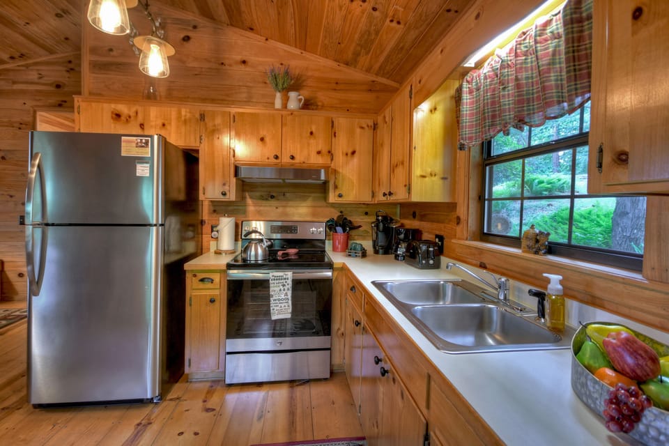 Stainless steel appliances and plenty of counter space at this romantic little cabin rental