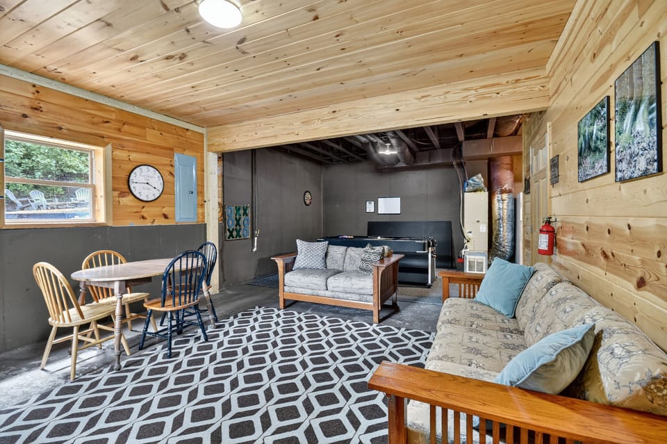 This large open room on the terrace level offers the perfect space for kids to stretch out, play games, or enjoy their own private retreat after a day of exploring the North Georgia mountains 