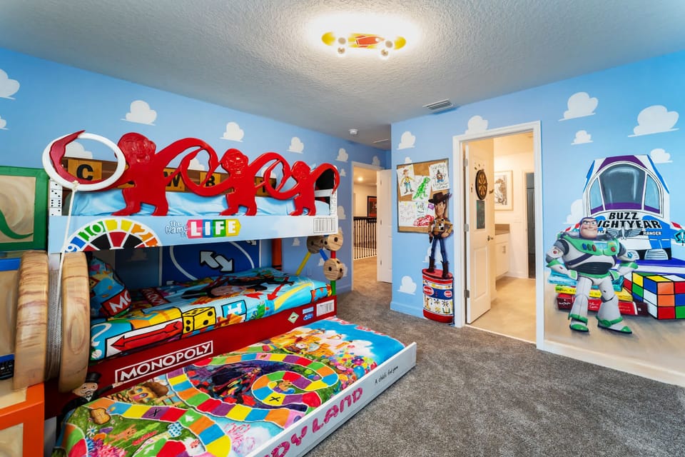 Experience the magic of Toy Story in this vibrant themed room with playful bunk beds, perfect for family adventures.