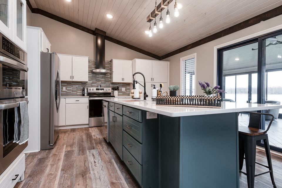 All new gourmet kitchen; double ovens; disposal, 9' island, coffee bar