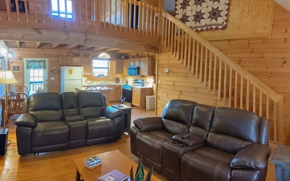 Open concept living room/kitchen/dining space. 