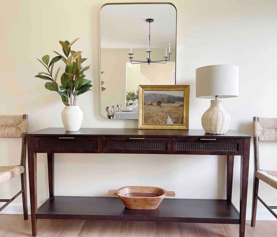 Modern end table designed with elegant decorative touches enhance the room's overall aesthetic.