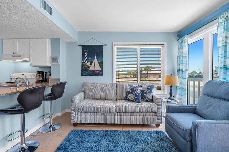 Sleeper Sofa - A Queen Sleeper Sofa adds a little extra space for the family and a Bar and Stools for extra dining space.