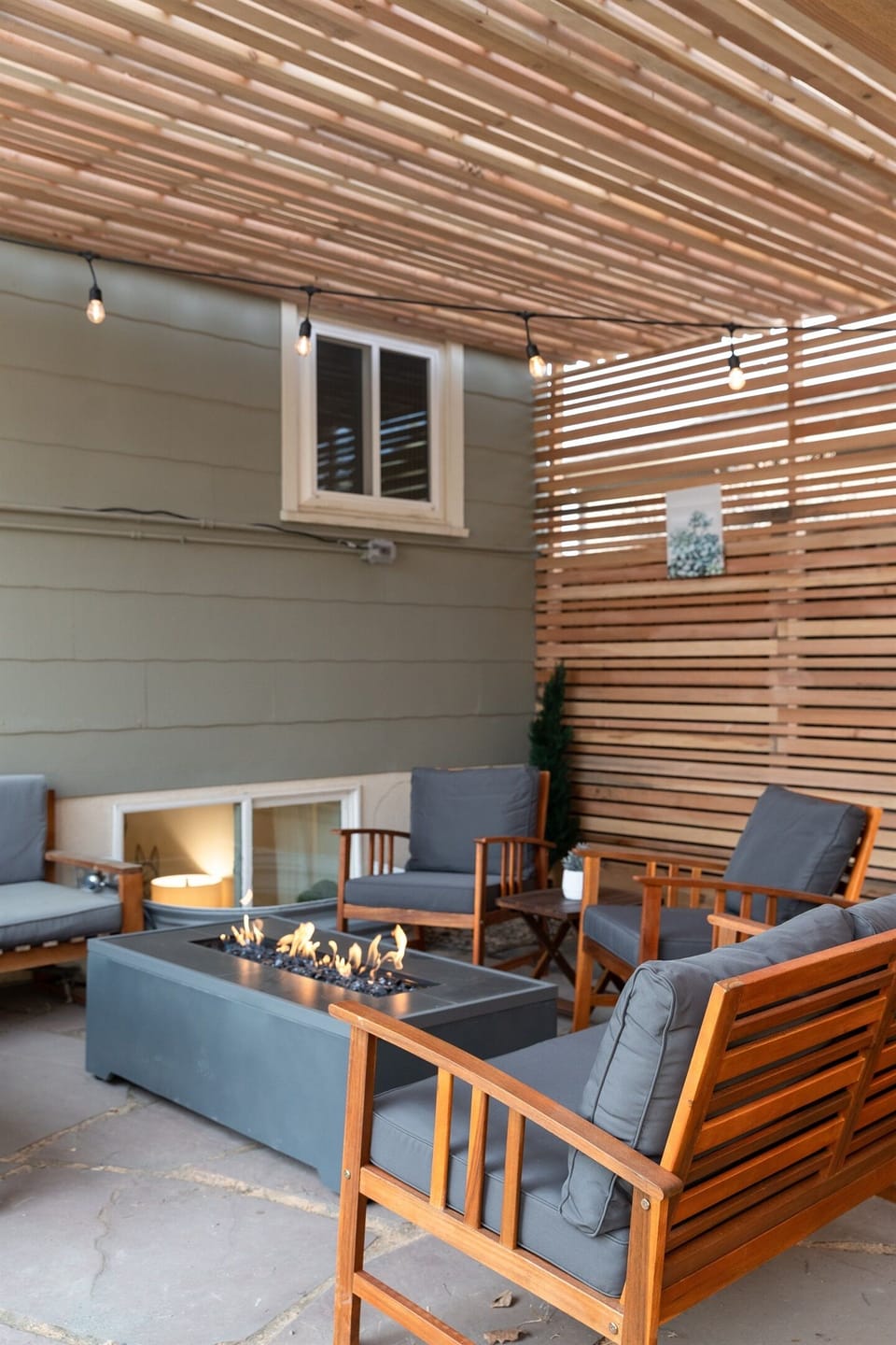 Cozy up and gather around the firepit in our covered patio