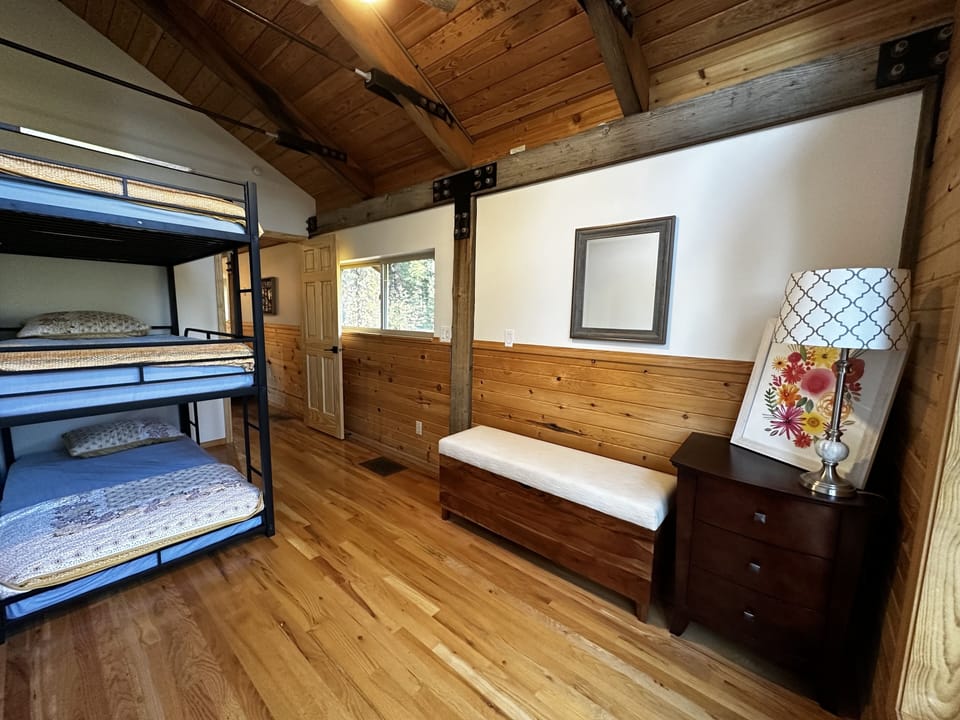 Upstairs bedroom 4. Three twin beds in a triple bunk bed setting.