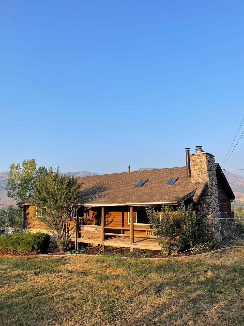 Cabin with front yard and backyard pasture on 1 acre of land