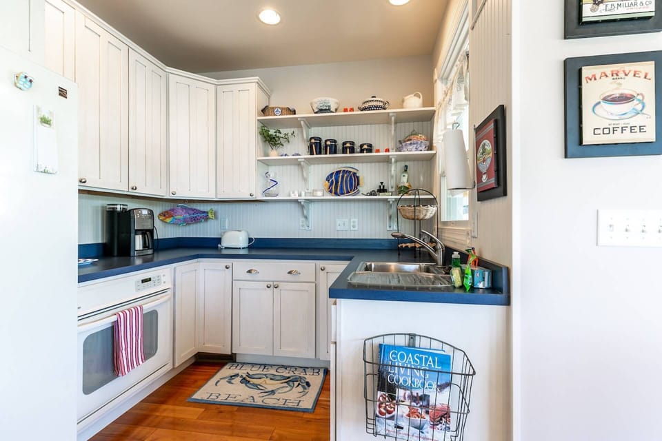 The pantry space includes a 2nd oven and sink, a coffee maker and other small appliances.