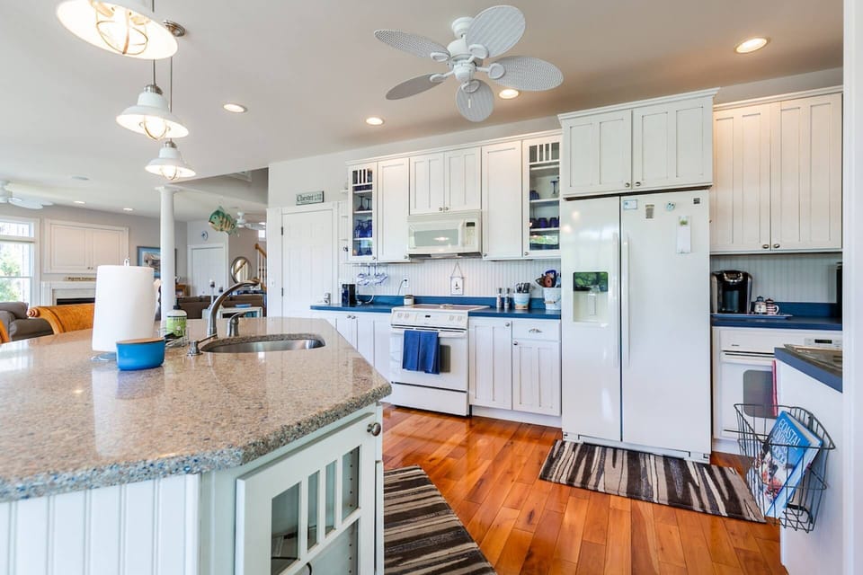 The gourmet kitchen is stocked with all the essentials for hosting large family meals.