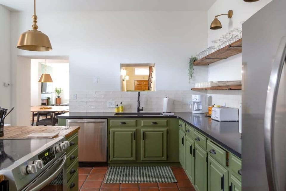 A spacious kitchen designed for cooking, gathering, and enjoying meals together during your stay. #TravelTogether
