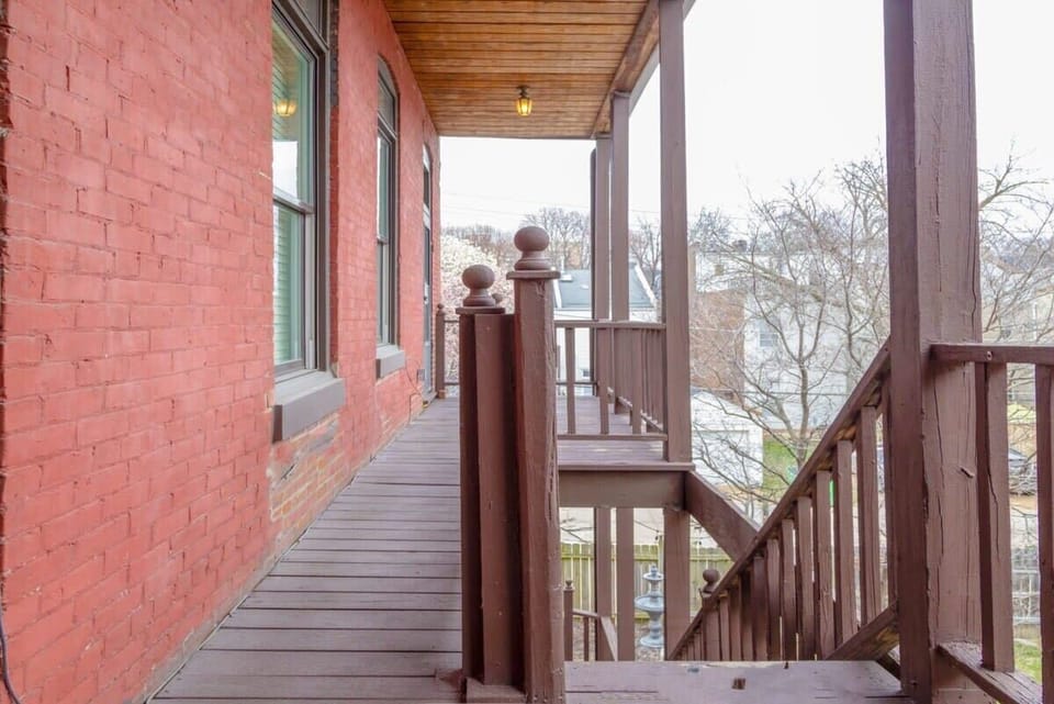 Private second-floor balcony with views of the neighborhood. A nice spot to step outside and enjoy some fresh air. #SecondFloorView