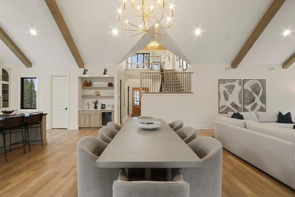 Dining table with seating for 8 off of the living room and kitchen