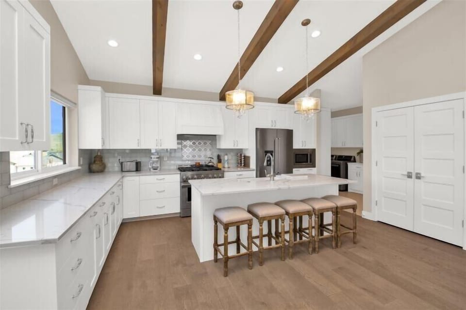Full kitchen with two dishwashers.