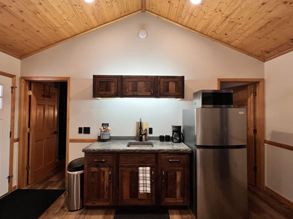 Kitchenette; coffee maker, refrigerator, microwave, toaster, hot plate, utensils