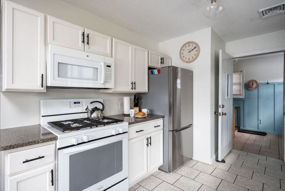 Enjoy home-cooked meals in our fully-equipped kitchen. With an open-concept main floor design, you'll enjoy meals as a group in spacious, comfortable space.
