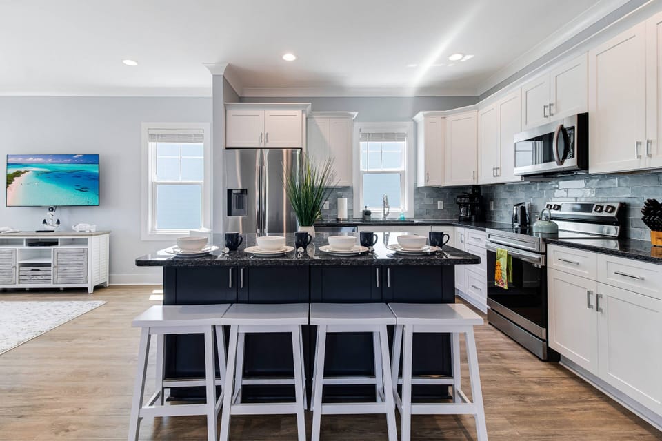 Large Kitchen Island. Eat, converse, keep the cook entertained, play games, assemble puzzles & lots of serving space.