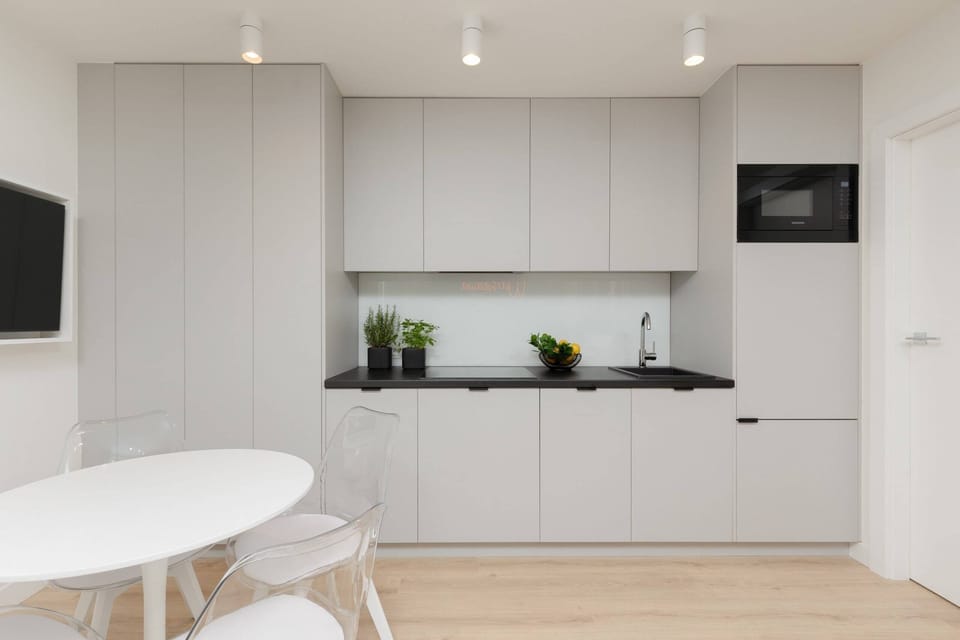 The fully equipped kitchenette includes everything you need for a home-cooked meal.