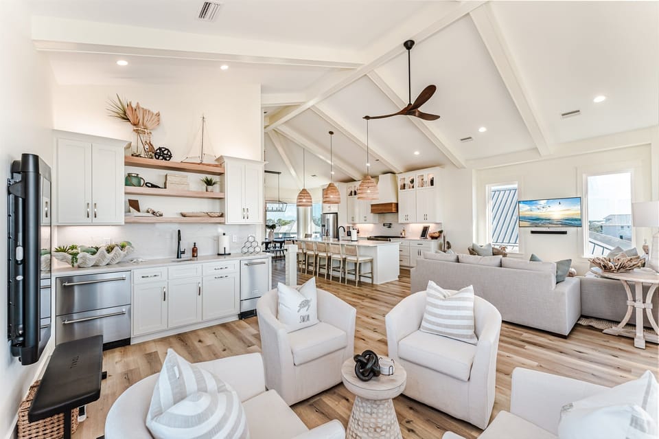 Wet Bar features a 2 drawer beverage cooler, ice maker, and a large assortment of beverage glasses.