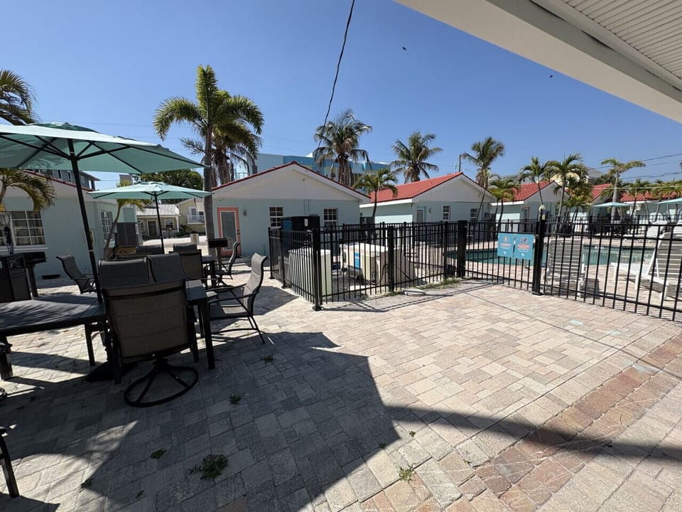 Courtyard with BBQ grills and dining area