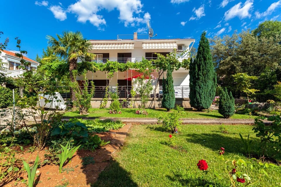Beautiful garden in front of the house, perfect for relaxing and enjoying nature.