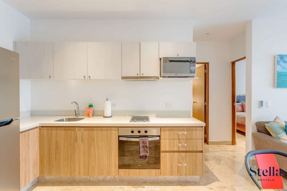 Whip up gourmet meals in your fully equipped modern kitchen with premium appliances!


