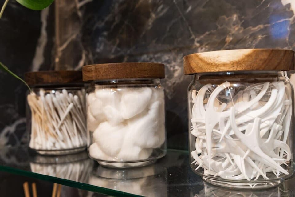 Bathroom Essentials with Fresh Towels & Supplies