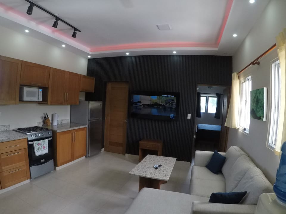 This condo has a full kitchen to prepare a meal or a tropical drink.