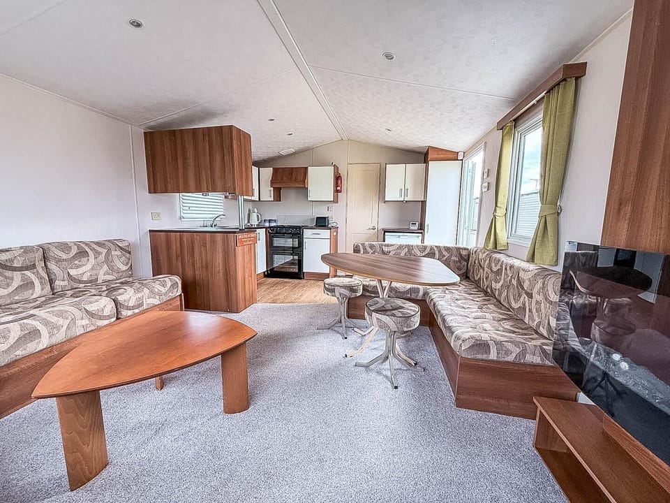 This communal space is the heart of your holiday retreat, allowing the whole family to be together whether you're cooking a meal, enjoying dinner, or relaxing on the sofa after a day of adventure in Hunstanton.