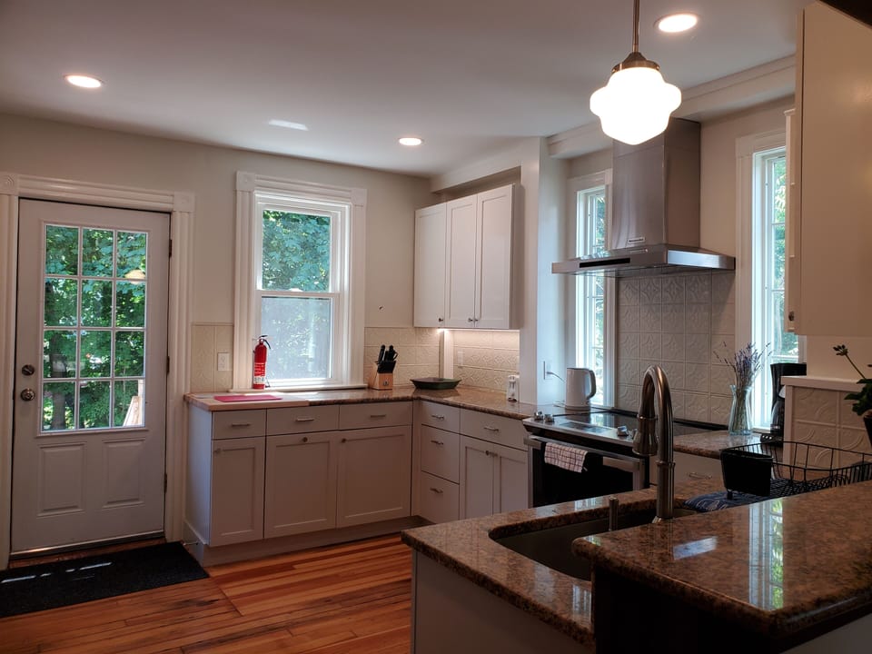 Walk outdoors to a dedicated yard and dining table.