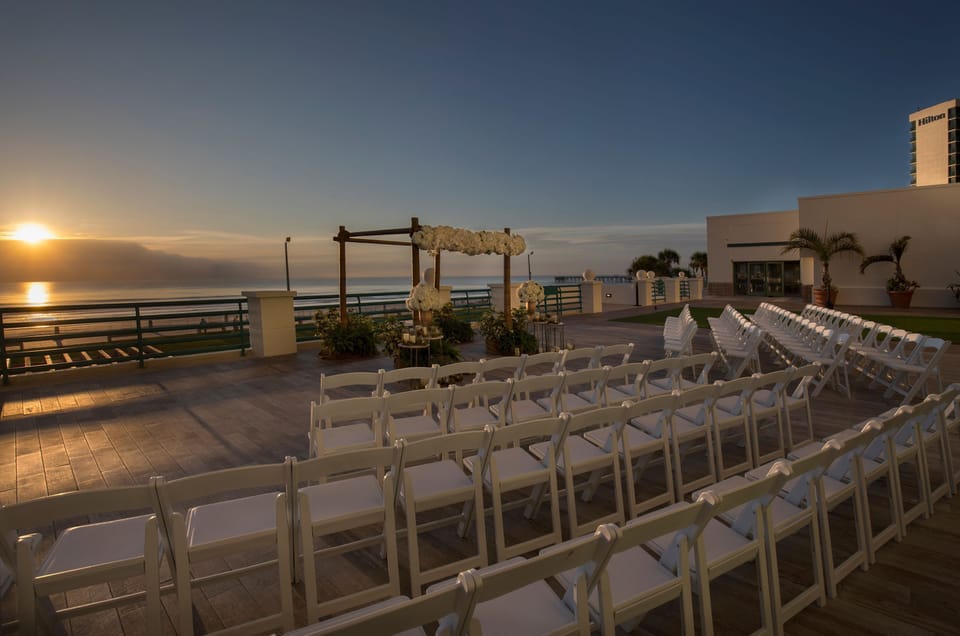 Toast unforgettable moments on the rooftop at golden hour.