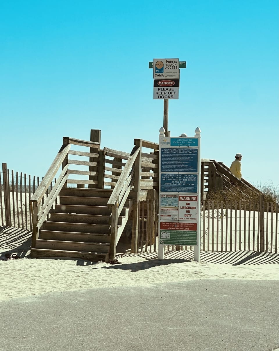 Sidewalk leads directly to beach access. Please do not walk on the sand dunes. 