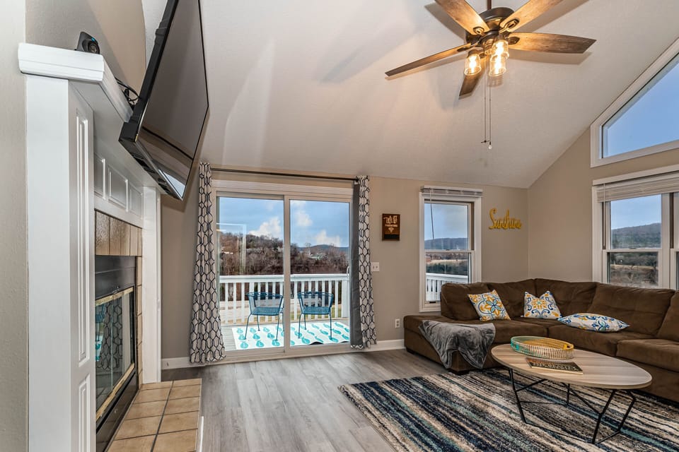 View onto deck with beautiful lake views. Propane grill for your use