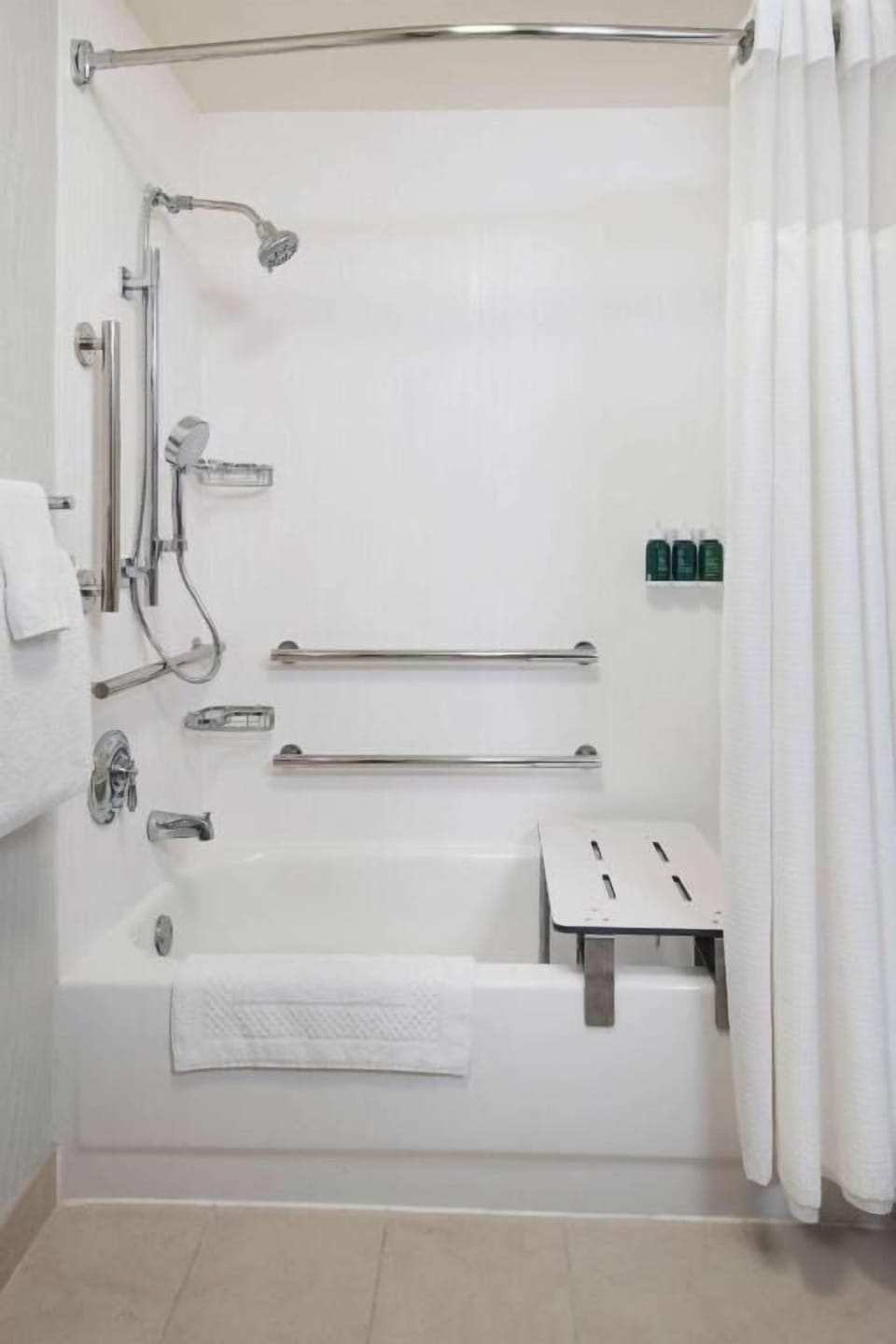 Refresh in an accessible walk-in shower with convenient grab bars.
