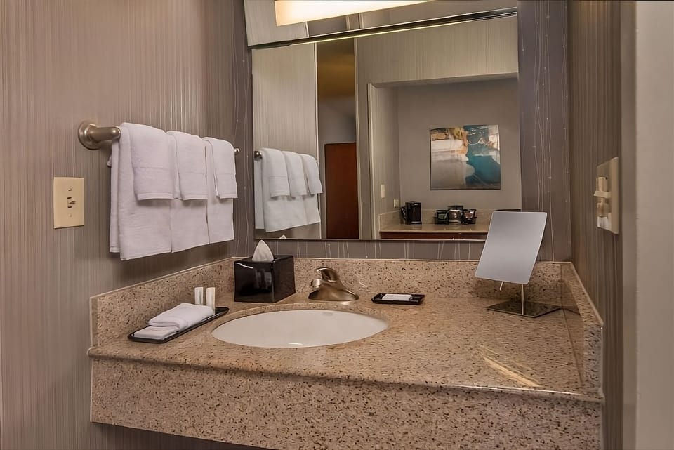 Unpack with ample wardrobe space and enjoy in-room entertainment.