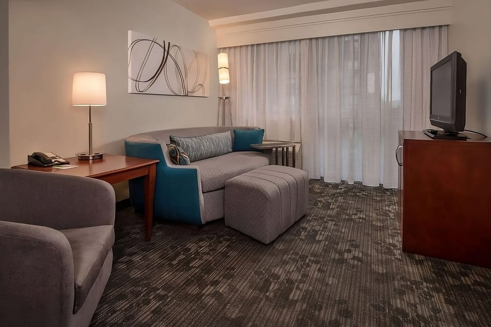 Get work done comfortably at the in-room desk and chair.