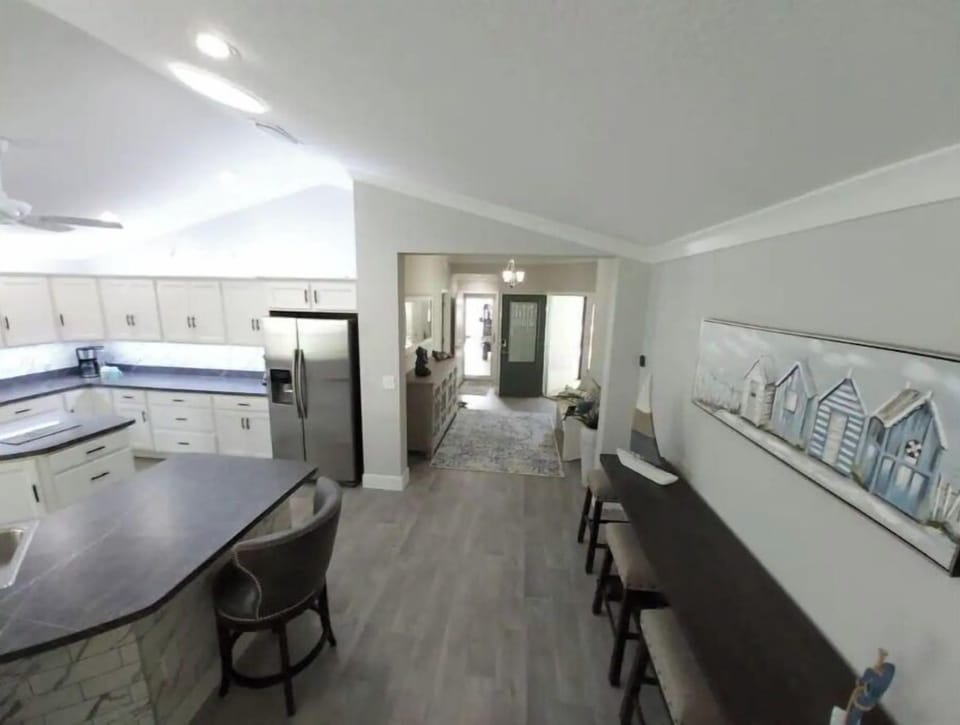 Looking from living room to front entry way