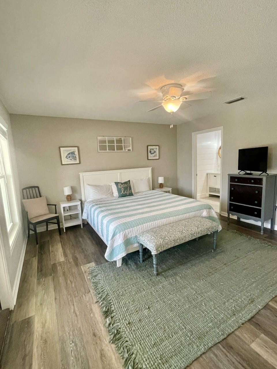 King Bedroom suite #3 with en-suite bathroom and ocean view balcony.