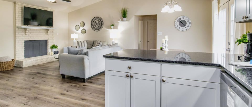 The kitchen's open concept allows for easy conversation and connection while cooking.