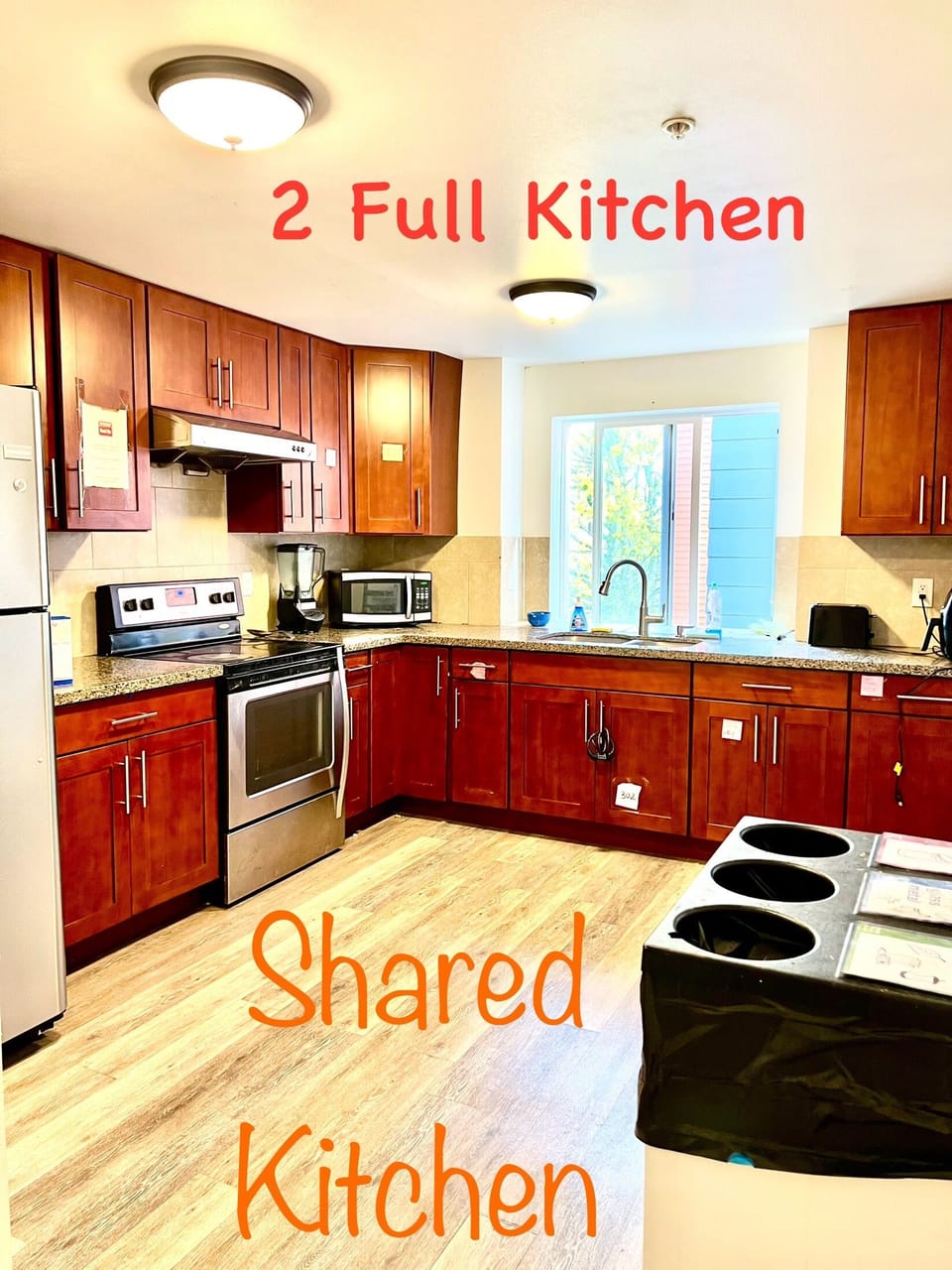 2 full size kitchen. 1 on the 1st floor and 1 on the same floor of this unit