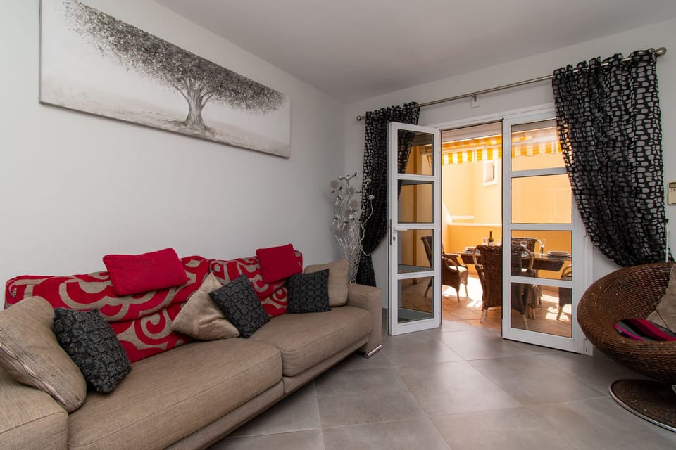 Lounge with patio doors to terrace