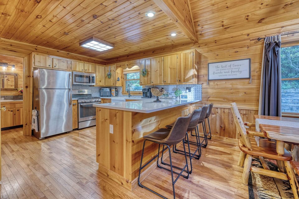 Bright, spacious kitchen with a gas stove, cookware, dishes, spices, oils, coffee supplies, and the essentials needed to cook, gather, and feel at home.