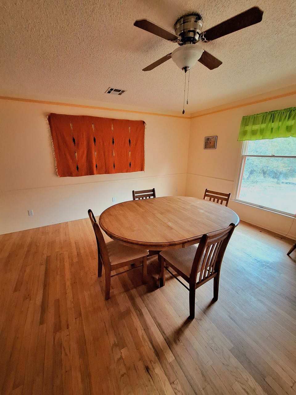 Dining room. There is also a breakfast nook in the kitchen.