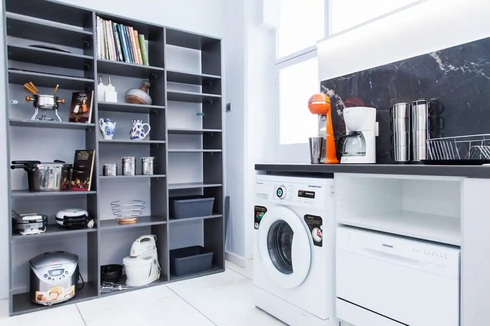 Kitchen marble floor, dishwasher, coffee maker, milk shake maker & pantry 