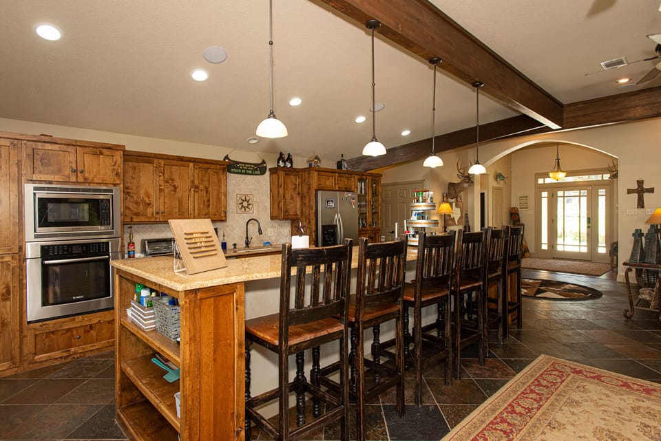 Another view of the spacious kitchen area.
